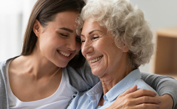 Senior mother and daughter hugging