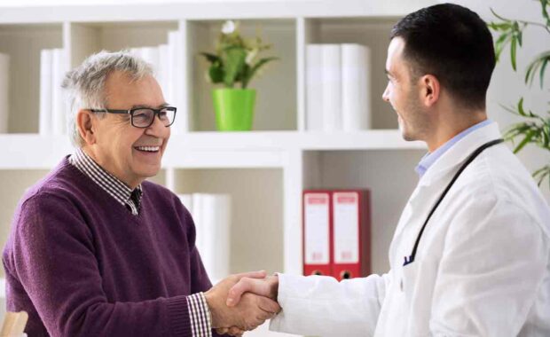 man at doctor after using a Senior Transportation Service