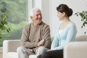 man using a Senior Citizen Transportation Service talking with volunteer