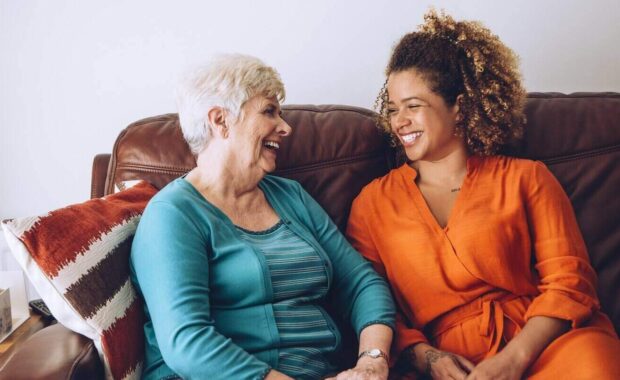 senior woman enjoying a laugh with her granddaughter