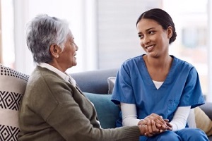 Northern Virginia caregiver with old lady holding hands