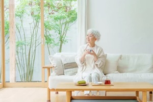 aging parent enjoying evening tea at home