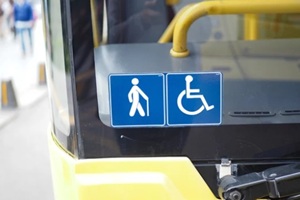 enhancing senior citizen transportation accessibility with yellow checkerboard symbols for public transportation icon display
