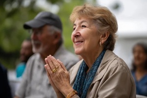 senior couple hands laughing dancing party with friends social gathering celebration