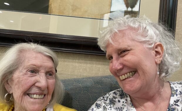 Shelby (left) and Barbara (right) smiling towards the camera