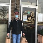 Cafe renaissance fine dinning man holding grocery bags